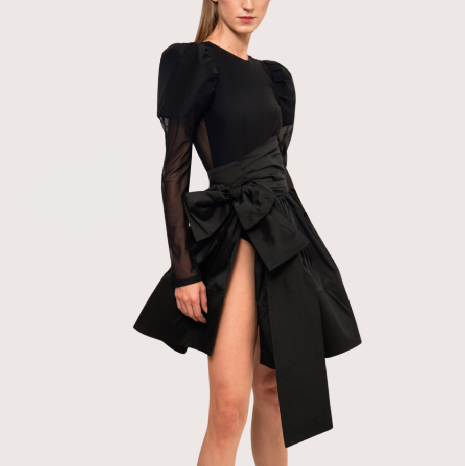 Black dress with sheer sleeves and a hot sale tag on a light gray background